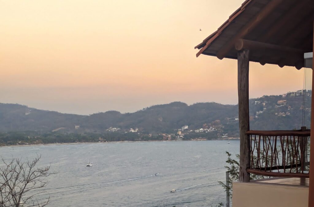 casa serena zihua endless pool and morning sunrise view of the bay